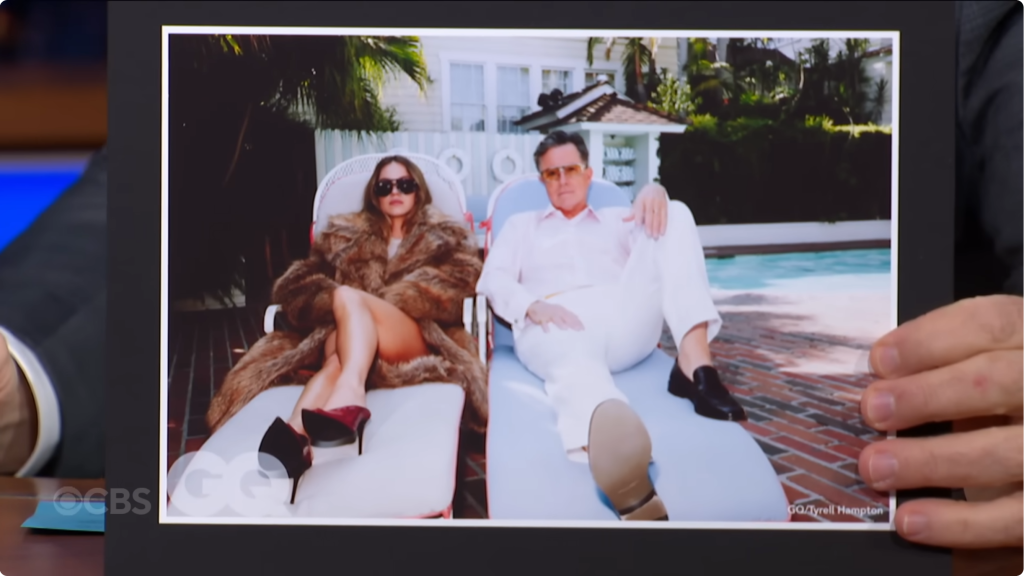 Sweeney and Stephen Colbert sitting together at the pool